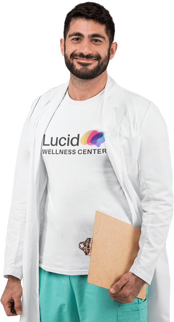 Doctor wearing logo shirt for Lucid Wellness Center - TMS Therapy in Los Angeles